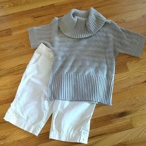 Short-sleeved, gray, peek-a-boo sweater.